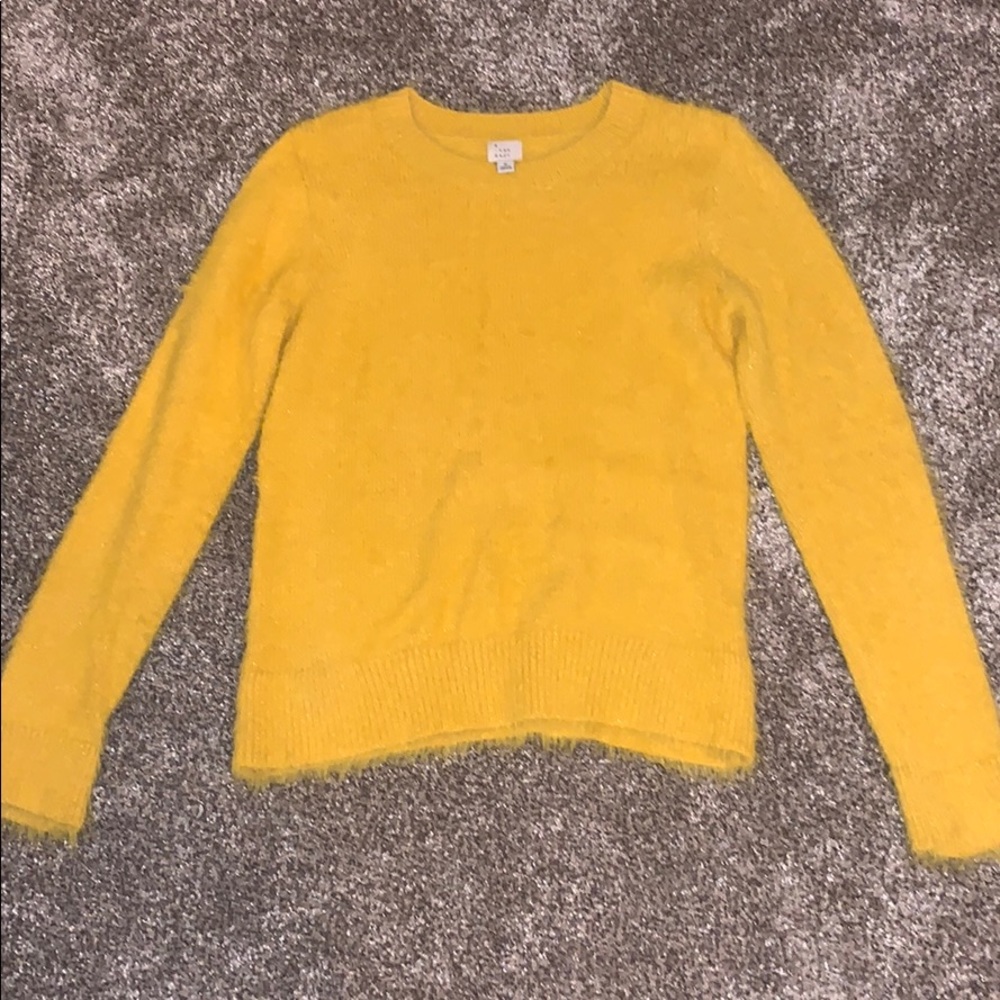 yellow fuzzy sweater